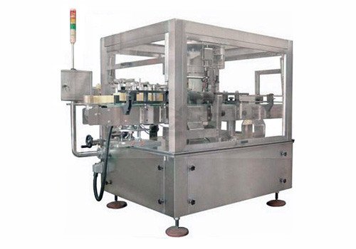 Double Side Stick Labeling Machine (Rotary type) 