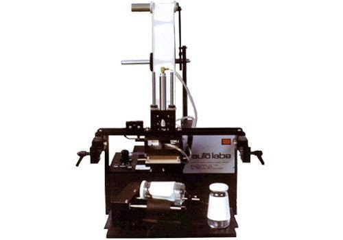 Model 565 Semi-Automatic Applicator for Tapered Products
